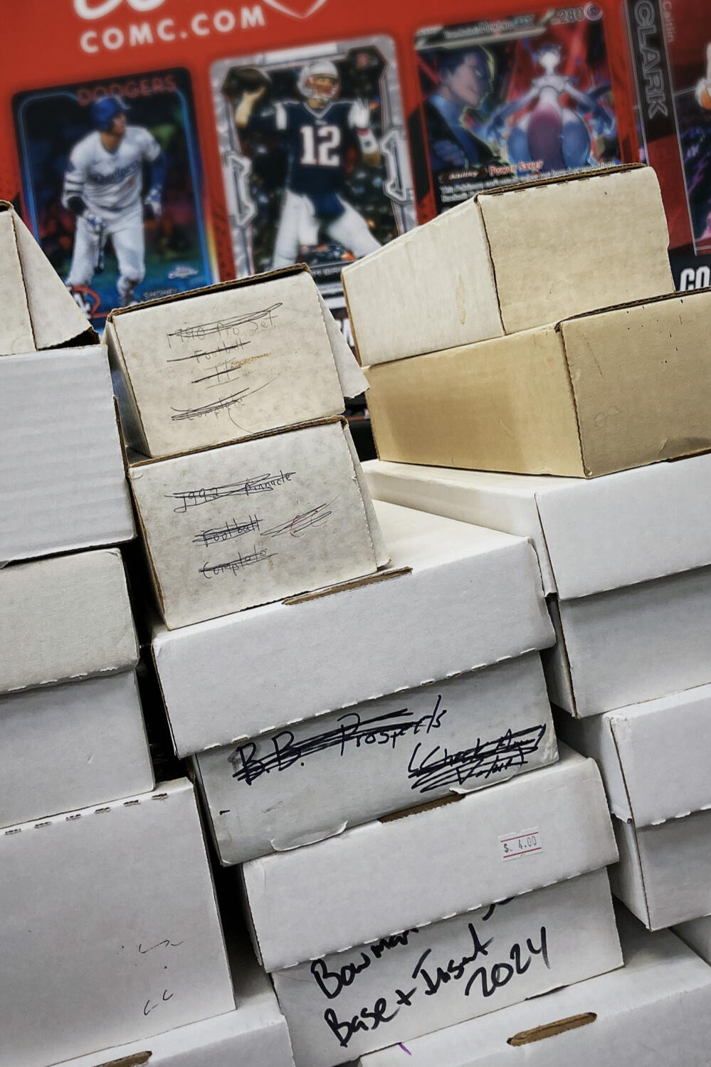 Stack of cardboard boxes at a card show